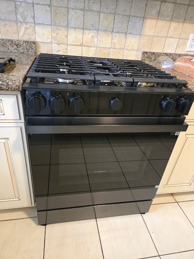 Black stainless gas range